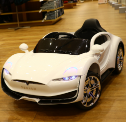 Детский электромобиль тесла