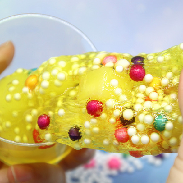 Слайм с цветными шариками и кубиками